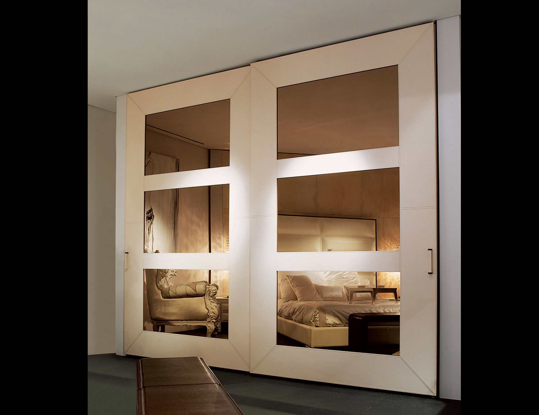 overlapping glass wardrobe fitting by hafele installed by the design indian wardrobe company